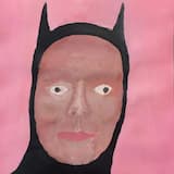 Bobby Bell Holds the Plate with Two Hands