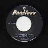 Te traigo en mi cartera