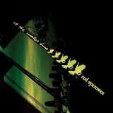 Buildings began to stretch wide across the sky, and the air filled with a reddish glow.