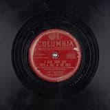 A Blue Serge Suit With a Belt in the Back